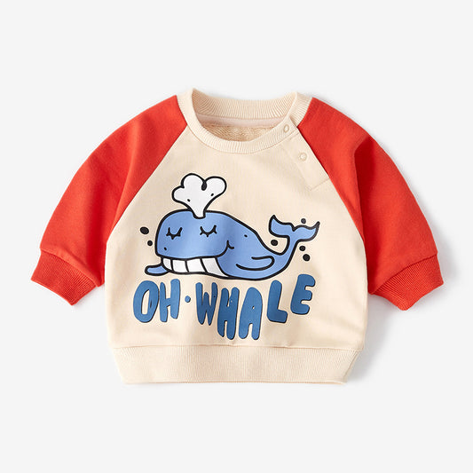 Sweater that says Oh Whale on chest